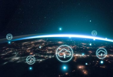Night image of sparkling cities and a sliver of daylight framing Digital world for banner background, remixed from public domain by Nasa